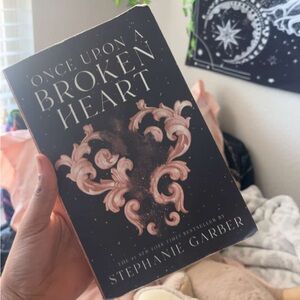 Black and Pink Coffee Table Book with Ornate Design